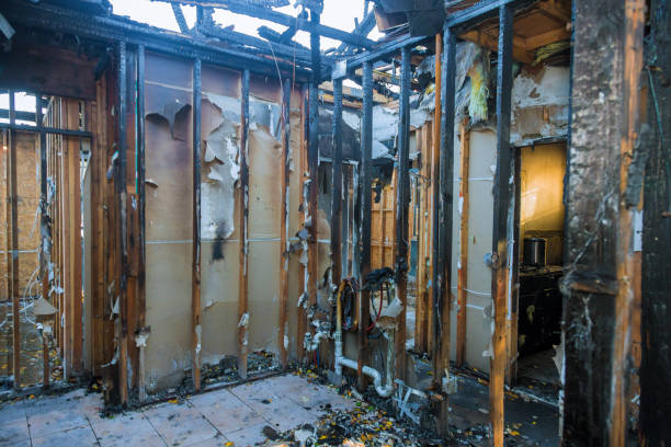 Professional Fire Damage Restoration technician working in Pittstown, NJ